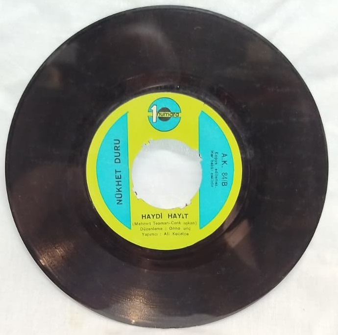 1977 NÜKHET DURU CAMBAZ HAYDİ HAYAT ORİJİNAL ANALOG BASKI DÖNEM 45 LİK PLAK