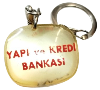 1950 YAPI KREDİ'NİN EFSANEVİ LEYLEK FİGÜRLÜ PROMOSYON ANAHTARLIK DÖNEMİN EKONOMİK TARİHİNİ YANSITAN NADİR BİR PARÇADIR